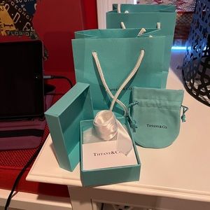 Tiffany gift wrap set LIKE NEW 4 pieces in each set
